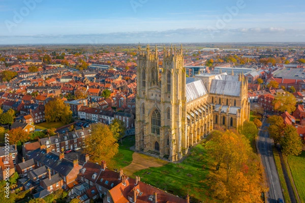 Fototapeta Overhead aerial top down view of Beverley Minster, the large gothic church in the centre of the small market town in East Yorkshire, UK. Shot in Autumn 2019