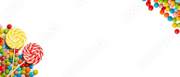 Fototapeta Mixed colorful fruit bonbon and candies on white background. Baner