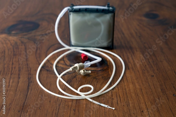 Obraz Antiparkinson medication gel (shown in the cartridge) is delivered to a patient's intestine via a jejunal tube or PEG-J.