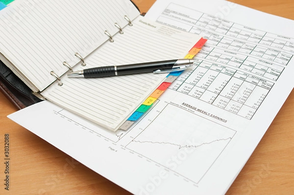 Fototapeta pen on notebook