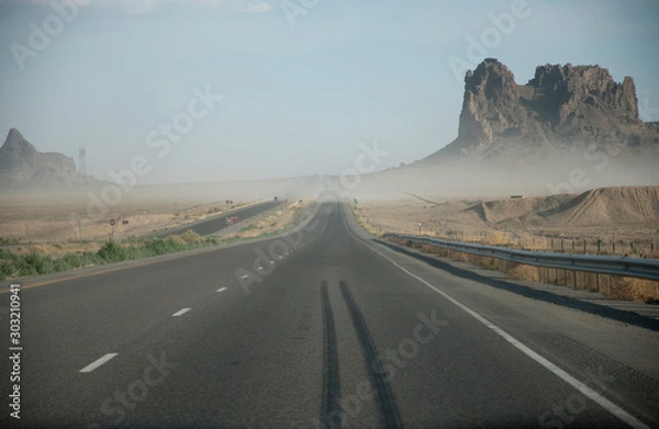 Obraz Straight road with sand storm in USA