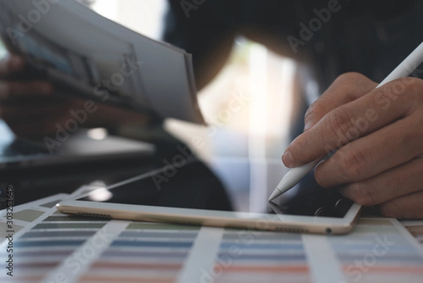 Fototapeta Designer working in studio