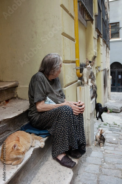 Obraz Stara kobieta w biedzie