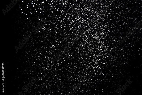 Obraz Realistic falling snowflakes. Isolated on black background.