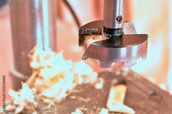 Fototapeta Close Up of Drill Bit Boring Holes