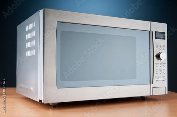 Obraz Microwave oven on the table