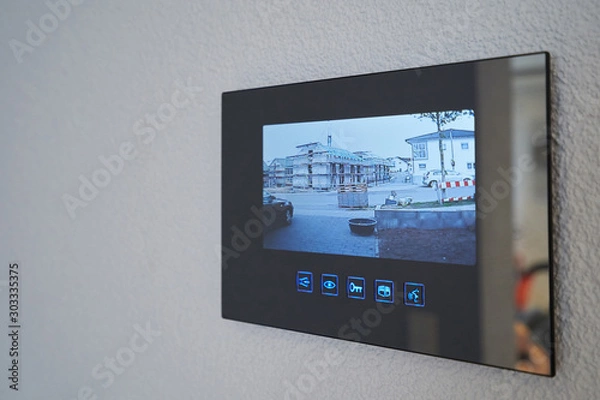 Obraz Intercom with video image mounted on the wall in the house. Close-up