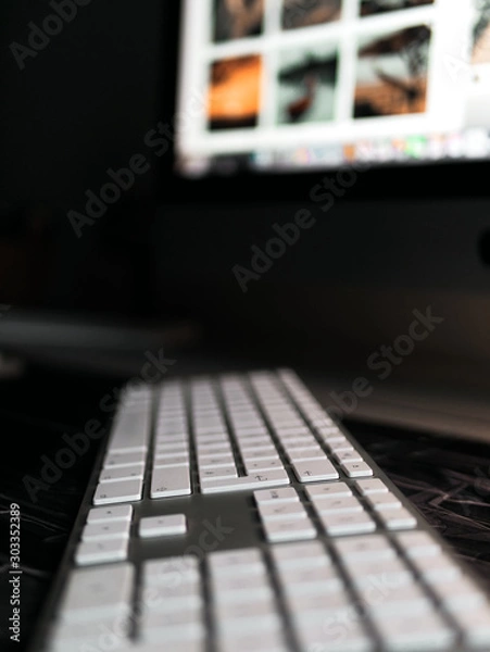 Fototapeta Am Computer