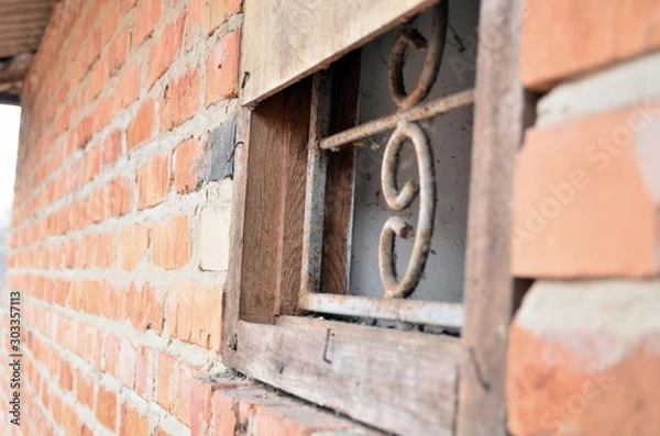 Obraz Background of orange brick wall and window