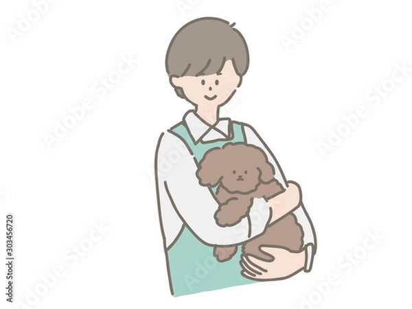 Fototapeta 子犬を抱っこするペットショップの店員さん