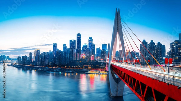 Obraz pejzaż miejski i panoramę centrum miasta w pobliżu wody chongqing o zachodzie słońca
