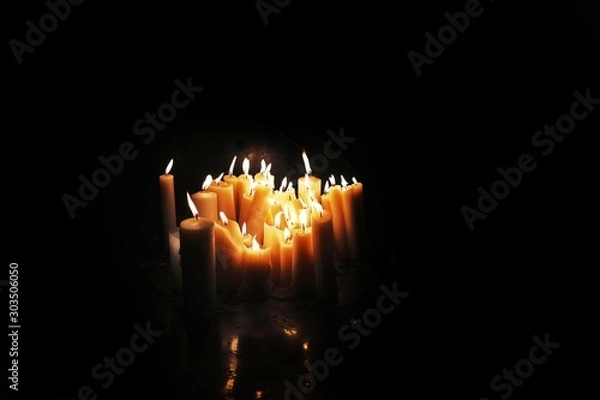 Obraz candles in the dark background