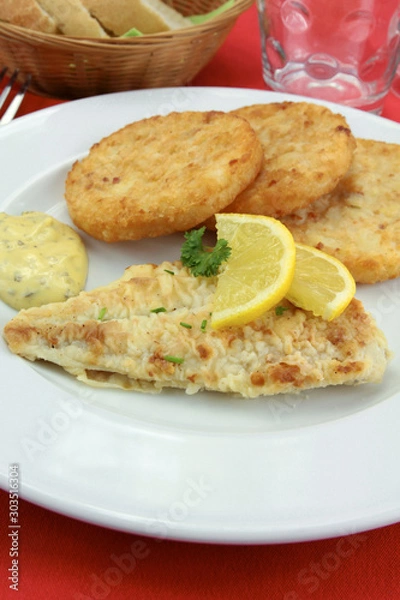 Fototapeta breaded fish and potato rosti