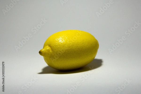 Fototapeta Fresh lemon on white background, fresh fruit