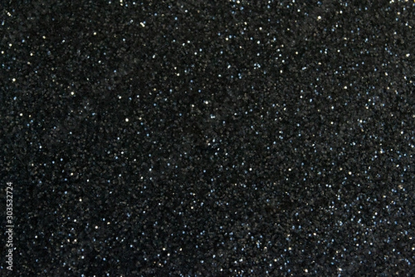 Obraz dark background in the form of a scattering of black and silver sequins