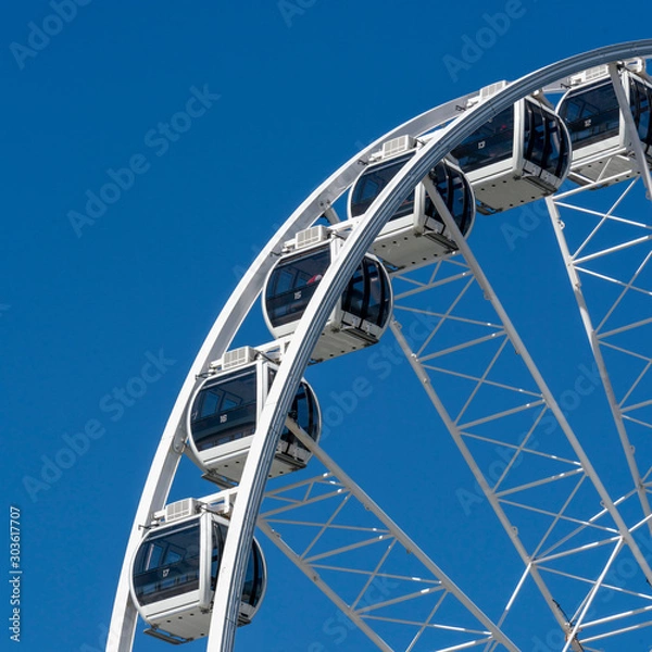 Fototapeta ferris wheel on a sunny day of the hague, netherlands