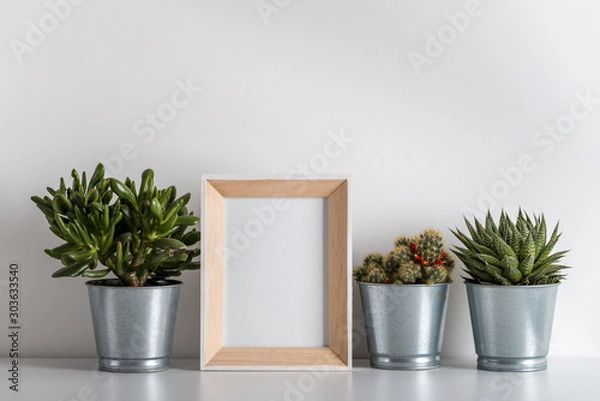 Obraz mock up made from photo frame in scandinavian minimalist interior with succulents