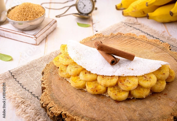 Obraz Tapioca Banana | Manioc flour pancake with caramelized banana, condensed milk and cinnamon - Typical food of the Brazilian Northeast