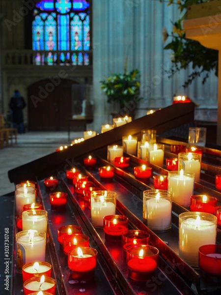 Fototapeta candles in a church