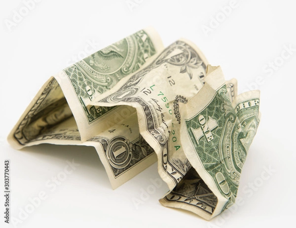 Obraz Two wrinkled dollars on a light background.