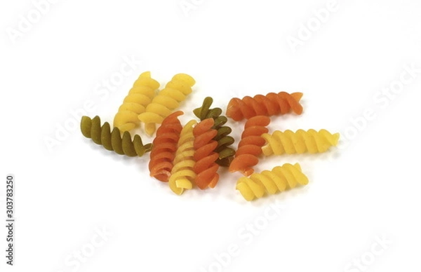 Obraz Multicolored Buckwheat spiral dry pasta isolated on white. Ancooked pasta noodles isolated on white background.