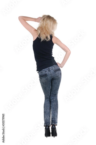 Obraz Young woman dancing. Rear view.