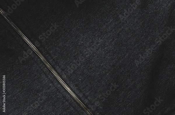Fototapeta Background image Jacket. Patterns of black fabric and metal zipper. focus And a dark tone.