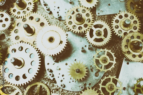 Fototapeta Closeup gears and cogs. Mechanism. Mechanic action.
