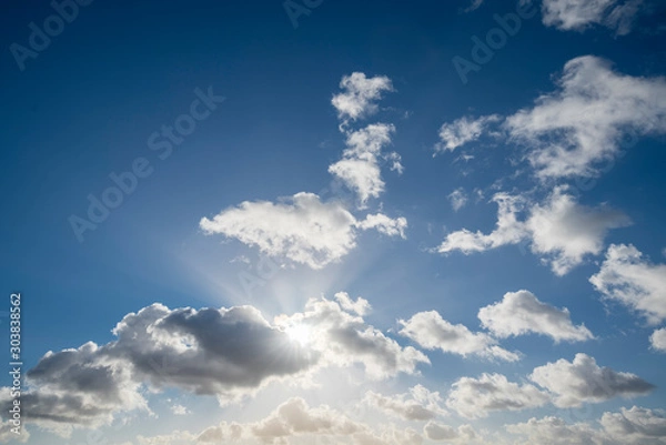 Obraz cloudscape with blue sky and sun for backgrounds
