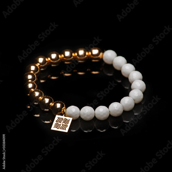 Obraz beads necklace on black background