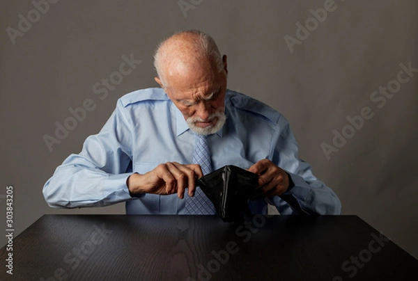 Obraz Old man in blue and empty wallet.