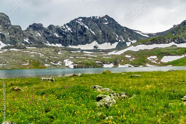 Obraz large cold lake high in the caucasus mountains