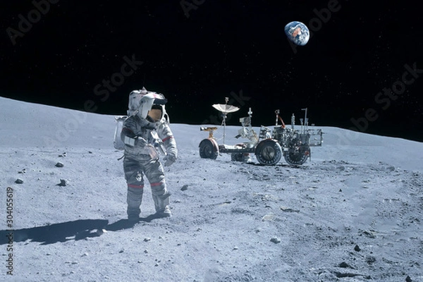 Fototapeta Astronauta w pobliżu łazika księżycowego na Księżycu. Z lądem na horyzoncie. Elementy tego obrazu zostały dostarczone przez NASA.