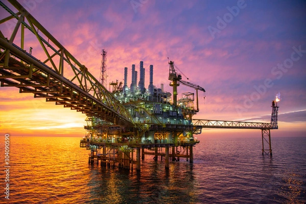 Fototapeta Offshore construction platform for production oil and gas. Oil and gas industry and hard work. Production platform and operation process by manual and auto function from control room.