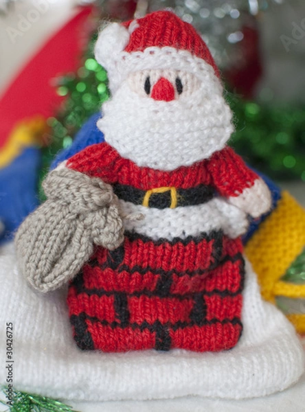 Obraz Knitted Santa Under Tree