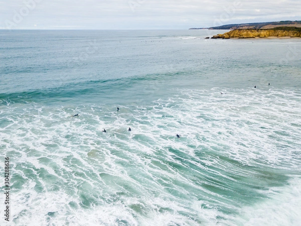 Fototapeta A group of surfer with waves