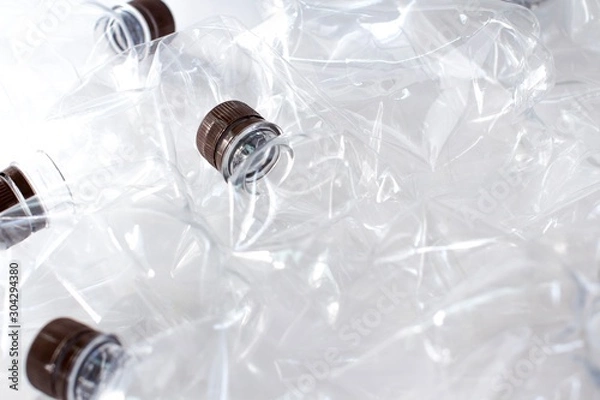Obraz empty transparent plastic bottles background