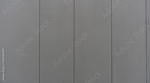 Obraz modern materials in the construction industry. Texture of metal cladding of a building facade closeup.