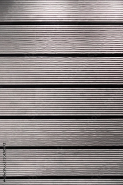 Fototapeta Ripple rough granite with black tile pattern wall / seamless texture / background texture / interior material