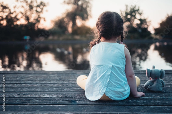 Obraz girl near a lake