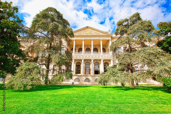 Fototapeta View to Dolmabahce palace surrounded by beautiful park. Istanbul, Turkey