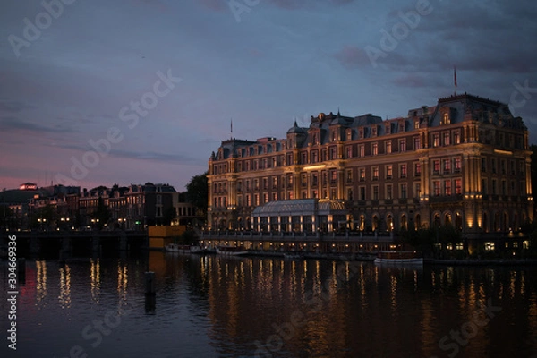Obraz Amstel Hotel in Amsterdam during sunset 