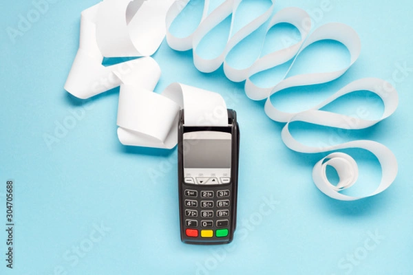 Obraz black pos terminal on blue background