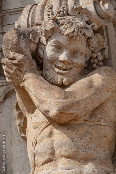 Obraz Old sculpture of funny and joyful dickens in downtown of Dresden, Germany, details, closeup