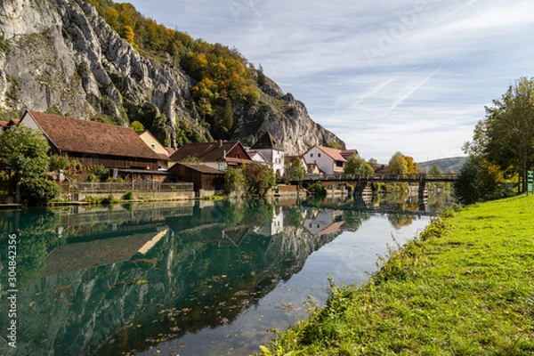 Obraz Idyllic view at the village Markt Essing in Bavaria, Germany with the Altmuehl river and high rocks