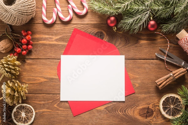 Fototapeta Red envelope on christmas holiday background