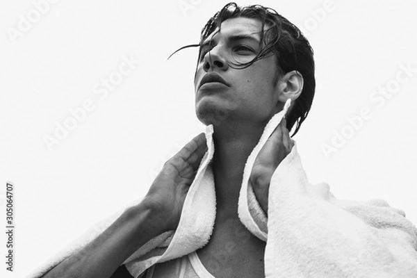 Obraz Muscle strong beautiful stripped male model portrait on isolated font background with shadow