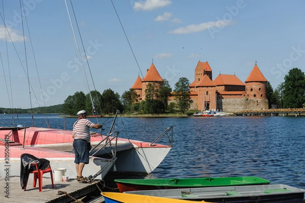 Fototapeta Old Trakai castle in sunny day. Trakai, Lithuania, Galve lake.