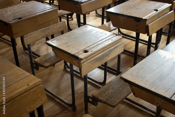 Obraz Old fashioned classroom and school desks 