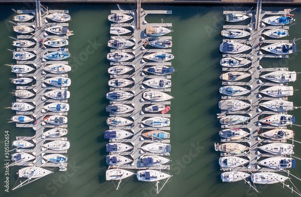 Fototapeta Drone view of a docks with yachts in Marina Del Rey California